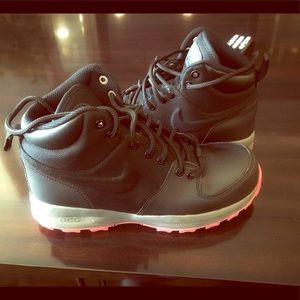 Pink and black Nike ACG boots